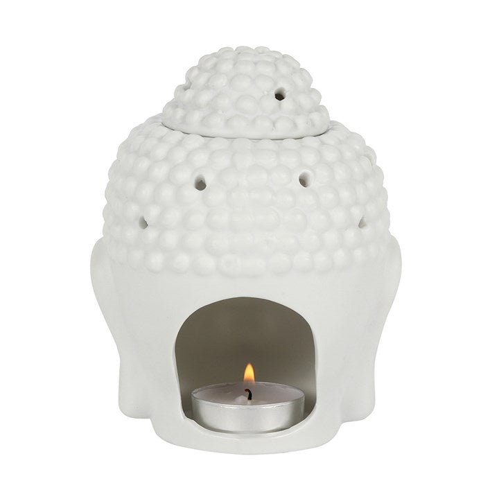 White Buddha head oil burner.
